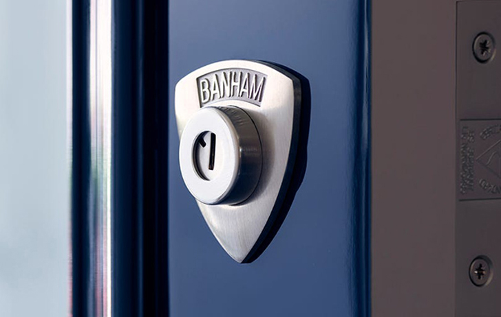 Banham door lock with cylinder guard